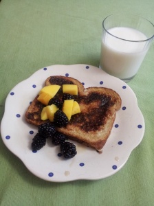 French toast with mangoes and blackberries